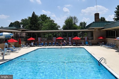 Nestled within the prestigious Greens at Leisure World, this on Leisure World Golf Club in Maryland - for sale on GolfHomes.com, golf home, golf lot