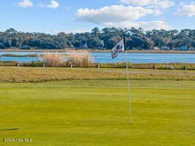 Welcome home to this amazing new construction home nearing on Lockwood Folly Country Club in North Carolina - for sale on GolfHomes.com, golf home, golf lot