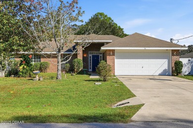 Beautiful and well-maintained 4-bedroom, 2-bath home located in on Palm Harbor Golf Club in Florida - for sale on GolfHomes.com, golf home, golf lot