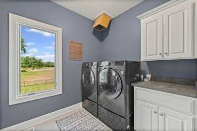 Welcome to this meticulously maintained one-owner 4-bed, 5-bath on Hodge Park Golf Club in Missouri - for sale on GolfHomes.com, golf home, golf lot