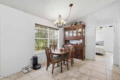 Beautiful and well-maintained 4-bedroom, 2-bath home located in on Palm Harbor Golf Club in Florida - for sale on GolfHomes.com, golf home, golf lot