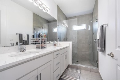 Modern townhouse located in the desirable gated community of on Boca Dunes Golf and Country Club in Florida - for sale on GolfHomes.com, golf home, golf lot