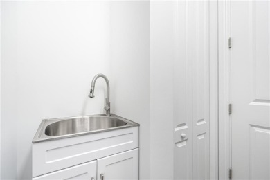 Modern townhouse located in the desirable gated community of on Boca Dunes Golf and Country Club in Florida - for sale on GolfHomes.com, golf home, golf lot