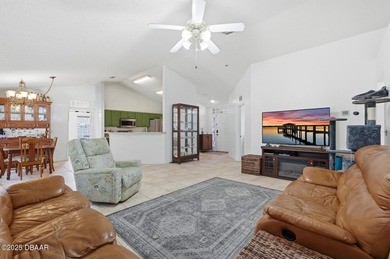 Beautiful and well-maintained 4-bedroom, 2-bath home located in on Palm Harbor Golf Club in Florida - for sale on GolfHomes.com, golf home, golf lot