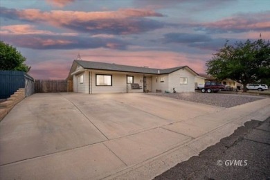 Run! Because this house is all that and a bag of chips! (If you on Mt. Graham Municipal Golf Course in Arizona - for sale on GolfHomes.com, golf home, golf lot