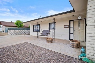 Run! Because this house is all that and a bag of chips! (If you on Mt. Graham Municipal Golf Course in Arizona - for sale on GolfHomes.com, golf home, golf lot
