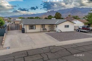 Run! Because this house is all that and a bag of chips! (If you on Mt. Graham Municipal Golf Course in Arizona - for sale on GolfHomes.com, golf home, golf lot