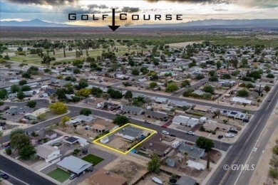 Run! Because this house is all that and a bag of chips! (If you on Mt. Graham Municipal Golf Course in Arizona - for sale on GolfHomes.com, golf home, golf lot