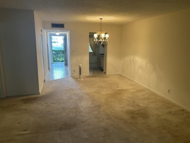 PRICE REDUCTION!!!!!!!!2 bedroom 2 bath condo with lake and golf on Colony West Country Club in Florida - for sale on GolfHomes.com, golf home, golf lot