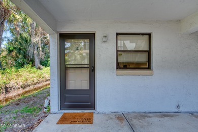 Discover this affordable and inviting first-floor 2-bedroom on Daytona Beach Golf Club in Florida - for sale on GolfHomes.com, golf home, golf lot