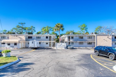 Discover this affordable and inviting first-floor 2-bedroom on Daytona Beach Golf Club in Florida - for sale on GolfHomes.com, golf home, golf lot