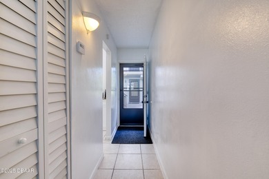 Discover this affordable and inviting first-floor 2-bedroom on Daytona Beach Golf Club in Florida - for sale on GolfHomes.com, golf home, golf lot