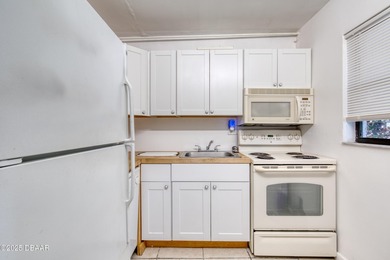 Discover this affordable and inviting first-floor 2-bedroom on Daytona Beach Golf Club in Florida - for sale on GolfHomes.com, golf home, golf lot