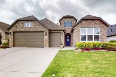 Exceptional Brick Weston Model with Golf Cart Garage.

Step into on Wildhorse Golf Club of Robson Ranch in Texas - for sale on GolfHomes.com, golf home, golf lot