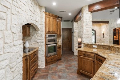 This immaculate, updated waterfront home in the exclusive on Pinnacle Golf and Boat Club in Texas - for sale on GolfHomes.com, golf home, golf lot