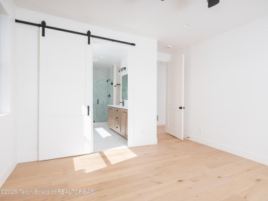 This brand-new custom home in Teton Reserve feels like a private on Teton Reserve in Idaho - for sale on GolfHomes.com, golf home, golf lot