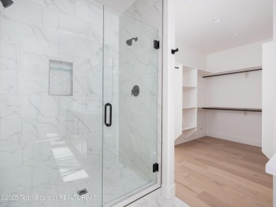 This brand-new custom home in Teton Reserve feels like a private on Teton Reserve in Idaho - for sale on GolfHomes.com, golf home, golf lot
