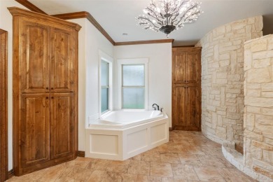 This immaculate, updated waterfront home in the exclusive on Pinnacle Golf and Boat Club in Texas - for sale on GolfHomes.com, golf home, golf lot