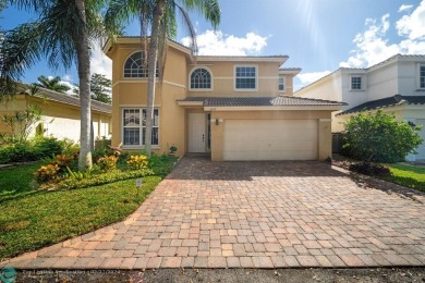 Price Just Reduced!  Amazing 4/3, 2-story pool home directly on on Palm-Aire Country Club and Resort - The Oaks in Florida - for sale on GolfHomes.com, golf home, golf lot