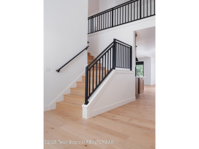 This brand-new custom home in Teton Reserve feels like a private on Teton Reserve in Idaho - for sale on GolfHomes.com, golf home, golf lot