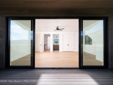 This brand-new custom home in Teton Reserve feels like a private on Teton Reserve in Idaho - for sale on GolfHomes.com, golf home, golf lot