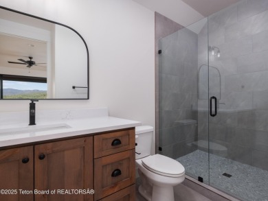 This brand-new custom home in Teton Reserve feels like a private on Teton Reserve in Idaho - for sale on GolfHomes.com, golf home, golf lot