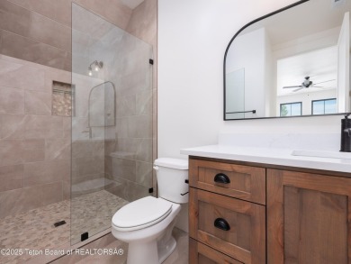 This brand-new custom home in Teton Reserve feels like a private on Teton Reserve in Idaho - for sale on GolfHomes.com, golf home, golf lot