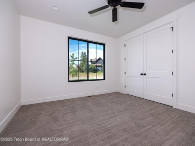 This brand-new custom home in Teton Reserve feels like a private on Teton Reserve in Idaho - for sale on GolfHomes.com, golf home, golf lot