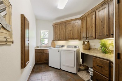 This immaculate, updated waterfront home in the exclusive on Pinnacle Golf and Boat Club in Texas - for sale on GolfHomes.com, golf home, golf lot