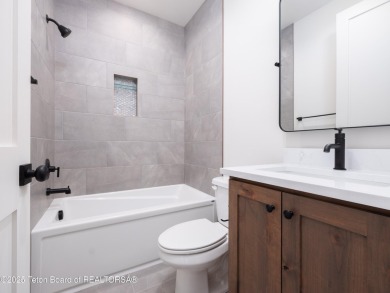 This brand-new custom home in Teton Reserve feels like a private on Teton Reserve in Idaho - for sale on GolfHomes.com, golf home, golf lot