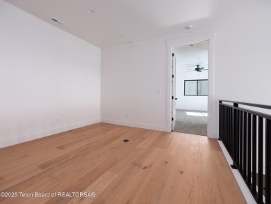 This brand-new custom home in Teton Reserve feels like a private on Teton Reserve in Idaho - for sale on GolfHomes.com, golf home, golf lot