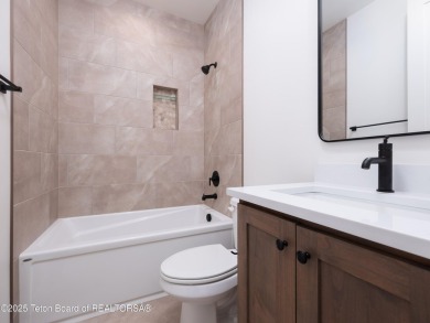 This brand-new custom home in Teton Reserve feels like a private on Teton Reserve in Idaho - for sale on GolfHomes.com, golf home, golf lot