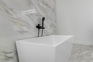 2025 ICF (Insulated Concrete Form) luxury home is built for on Sugarmill Woods Golf and Country Club in Florida - for sale on GolfHomes.com, golf home, golf lot