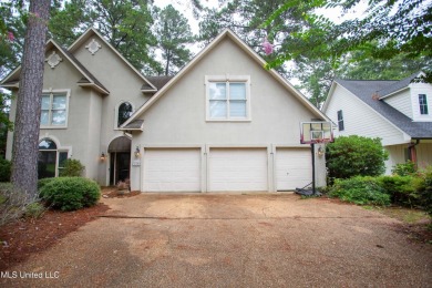 Welcome to 132 Pine Ridge Circle--an exceptional two-story home on Bay Pointe Golf and Resort in Mississippi - for sale on GolfHomes.com, golf home, golf lot