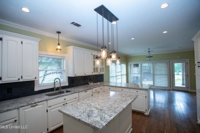 Welcome to 132 Pine Ridge Circle--an exceptional two-story home on Bay Pointe Golf and Resort in Mississippi - for sale on GolfHomes.com, golf home, golf lot