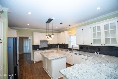 Welcome to 132 Pine Ridge Circle--an exceptional two-story home on Bay Pointe Golf and Resort in Mississippi - for sale on GolfHomes.com, golf home, golf lot
