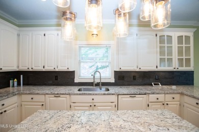 Welcome to 132 Pine Ridge Circle--an exceptional two-story home on Bay Pointe Golf and Resort in Mississippi - for sale on GolfHomes.com, golf home, golf lot