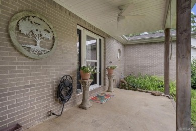 Peaceful Diamondhead Retreat with Golf Course Views  Sunroom on Diamondhead Golf and Country Club in Arkansas - for sale on GolfHomes.com, golf home, golf lot