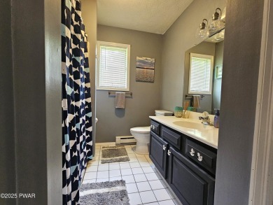 Live the Lake Lifestyle in Prestigious Tanglwood Lakes- Fully on Paupack Hills Golf and Country Club in Pennsylvania - for sale on GolfHomes.com, golf home, golf lot