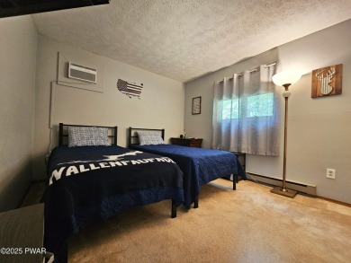 Live the Lake Lifestyle in Prestigious Tanglwood Lakes- Fully on Paupack Hills Golf and Country Club in Pennsylvania - for sale on GolfHomes.com, golf home, golf lot