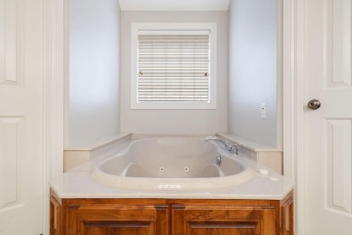 Welcome to 115 Ironwood, a beautifully maintained 5-bedroom, 3 on Island Green Golf Club in Missouri - for sale on GolfHomes.com, golf home, golf lot
