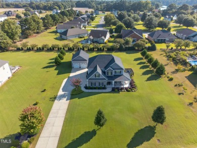 CUSTOM-BUILT HOME with over 3,000 SQ FT plus a LARGE UNFINISHED on Walnut Creek Country Club in North Carolina - for sale on GolfHomes.com, golf home, golf lot