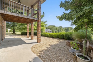 Welcome to 115 Ironwood, a beautifully maintained 5-bedroom, 3 on Island Green Golf Club in Missouri - for sale on GolfHomes.com, golf home, golf lot