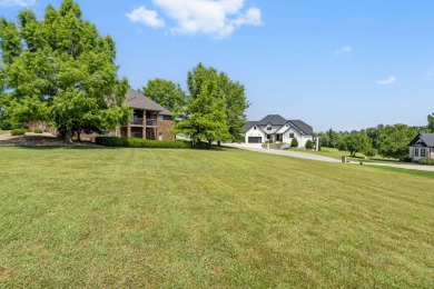 Welcome to 115 Ironwood, a beautifully maintained 5-bedroom, 3 on Island Green Golf Club in Missouri - for sale on GolfHomes.com, golf home, golf lot