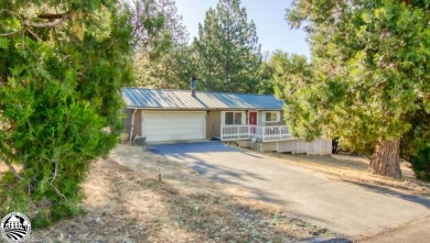 This cute one-level, 3 bedroom two bath home boasts new floors on Pine Mountain Lake Country Club in California - for sale on GolfHomes.com, golf home, golf lot