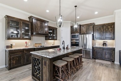 Welcome home to this beautifully designed newer-built property on Legends Country Club in Texas - for sale on GolfHomes.com, golf home, golf lot