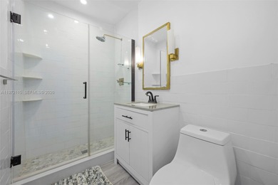 Refined two-story residence in North Coral Gables, set along a on Granada Golf Club in Florida - for sale on GolfHomes.com, golf home, golf lot