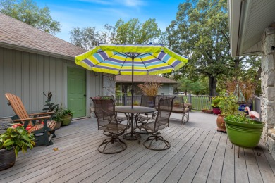 Surrounded by mature trees on a peaceful lot, this home blends on The Coves Golf Course in Oklahoma - for sale on GolfHomes.com, golf home, golf lot