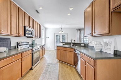 Welcome to 4816 W Red Maple Circle, where modern elegance meets on Golf Club At Wescott Plantation in South Carolina - for sale on GolfHomes.com, golf home, golf lot