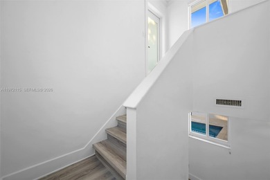 Refined two-story residence in North Coral Gables, set along a on Granada Golf Club in Florida - for sale on GolfHomes.com, golf home, golf lot